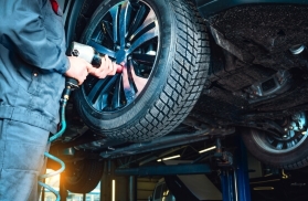 Tires fitting at the car service station.